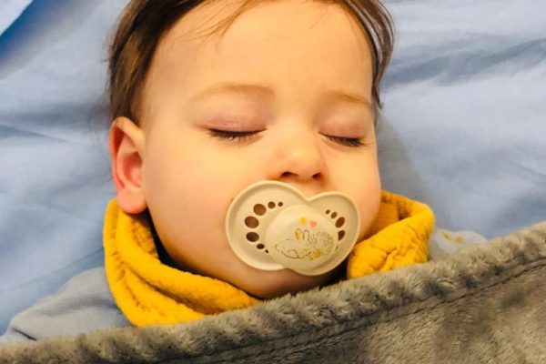 Sleeping child at Play B C Preschool